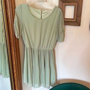 Key lime colored pleated mid thigh dress. SUPER pretty on. Perfect for spring!